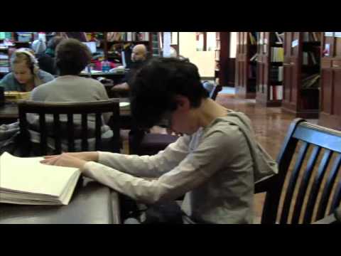 child_reading_braille_book.jpg